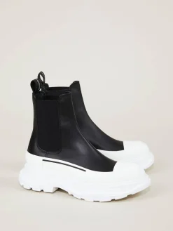 Boots mit breiter Gummisohle Schwarz/Weiß