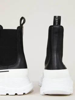 Boots mit breiter Gummisohle Schwarz/Weiß