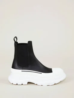 Boots mit breiter Gummisohle Schwarz/Weiß