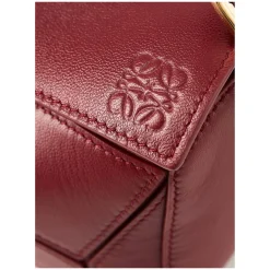 Handtasche 'Puzzle Featherlight Mini' Burnt Red